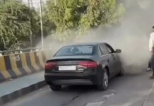 सड़क पर दौड़ती लग्जरी कार बनी आग का गोला, चालक ने कूदकर बचाई जान Luxury Car Blaze