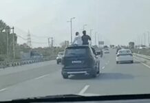हाईवे पर जानलेवा स्टंट का VIDEO वायरल: चलती SUV की छत पर बैठे युवक, पुलिस ने की कार्रवाई Scorpio Stunt Video